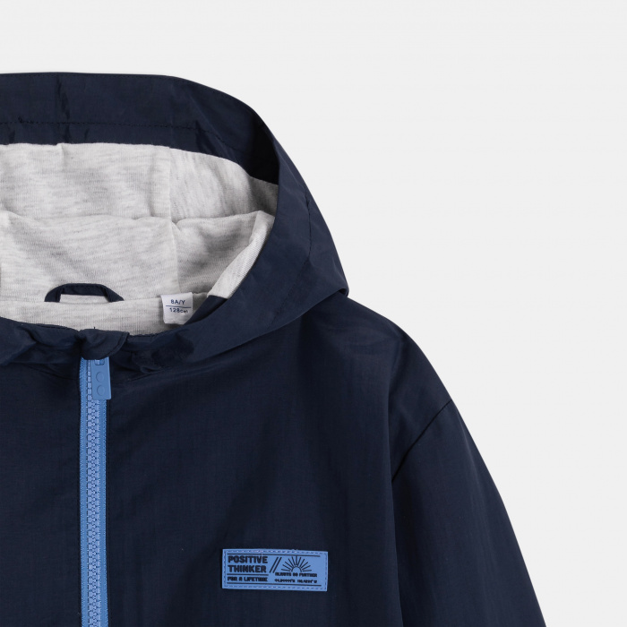 Синьо непромокаемо яке за момче.