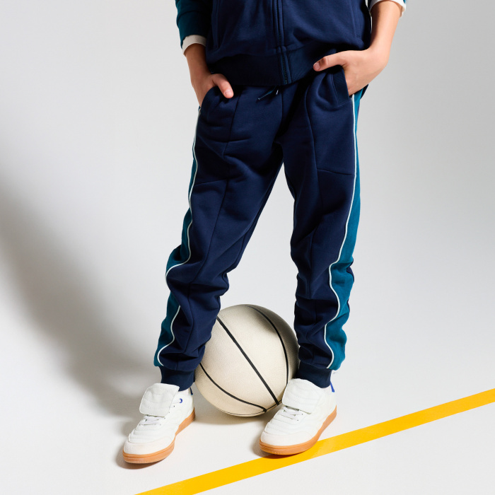 Сиви спортни панталони с контрастни ленти