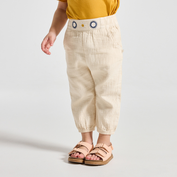 Бежови панталони от памучен плат