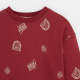 Червен пуловер с щампа
